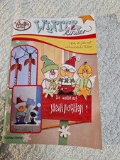 Winterkinder. Holz & Filz auf