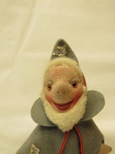 X-39316	Kersa Sandmann, H. ca. 26,5 cm, mit Gebrauchsspuren, zwei Sterne fehlen