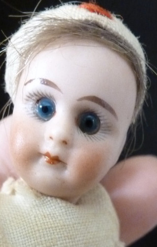 Antike kleine puppe - kleine,
