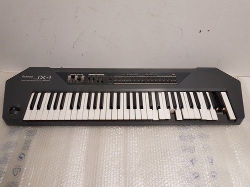 Roland synthesizer - jx,