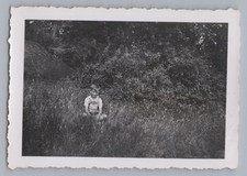Boy in Leather Pants Sitting