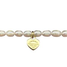 Vergoldeter Tiffany & Co  Herzanhänger an markenlosem Perlenarmband, Geschenkbox