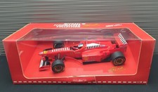 1:18 SCHUMACHER Ferrari F310 +