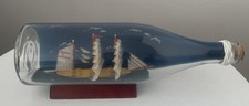 Flaschenschiff , Buddelschiff Glas/Holz  L =27 cm
