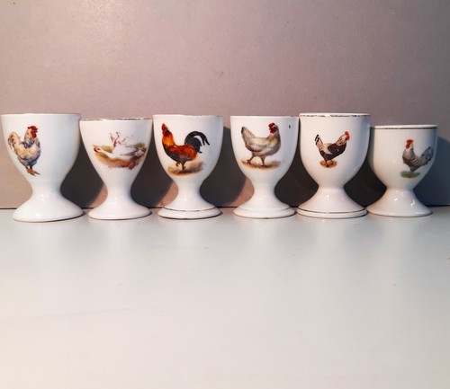 Antique egg cups with - 6,
