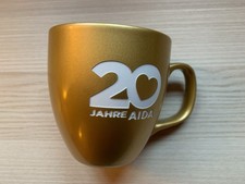 AIDA Tasse 20 Jahre - gold