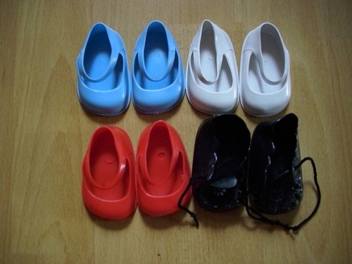Paar puppenschuhe aus - 4,
