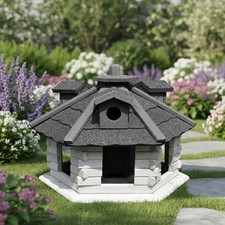 Vogelhaus mit Futterspender