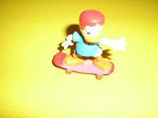 FIGUR  DONALD  DUCK AUD SKATEBOARD