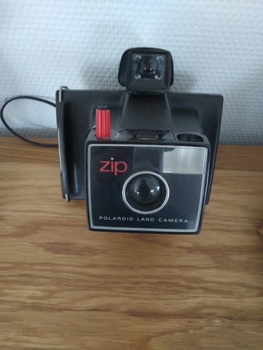 Polaroid land camera - land, camera.