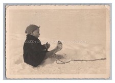 Boy with Wool Tights Playing