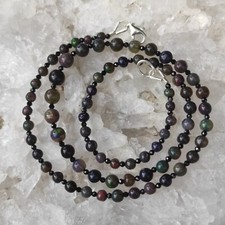 Schwarze Welo Opal Heilstein