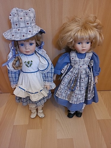 Porzellanpuppe mit blauem - 2x,