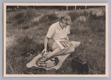 Woman Reading In Magazine Next