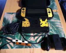 Nintendo Switch Spielkonsole inkl Tasche & Let's Go Pikachu, Worms, Monopoly