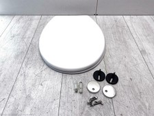 Langsam absenkender WC-Sitz