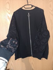 Strickjacke Mit Spitzenärmel