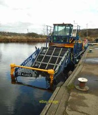 Photo 6x4 Berky weed harvester