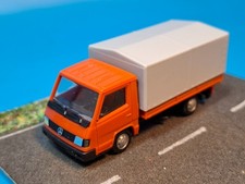 Herpa 1:87 / H0 Mercedes-Benz 100D Pritsche/Plane rotorange