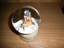 Schneekugel mit Spieluhr