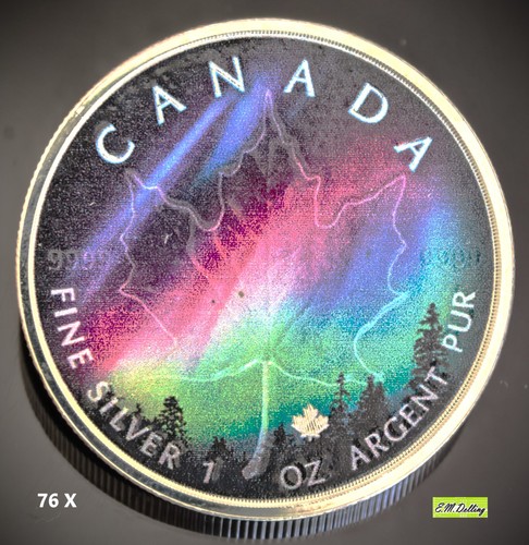 Dollars maple leaf - $,