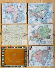 5 x Holz-Puzzle + Atlas