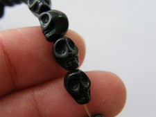 48 schwarze Totenkopf Perlen 8
