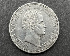 900/- Silbermünze, Ein