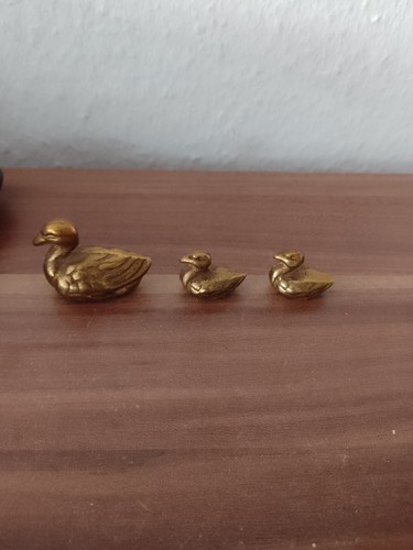 Alte entenfamilie aus messing - aus,