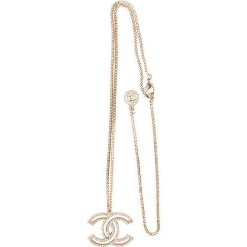 Chanel crystal emblem dore - cc,