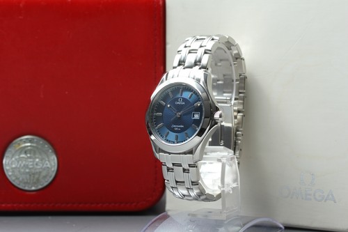 Boxed near mint omega - mint],