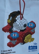 SNOOPY im Flugzeug BlueBrixx