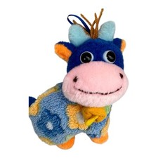 bunte Kuh mit Blumenmuster