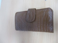 Geldbörse mit 135 LEI in Münzen und 1000 Lire Schein