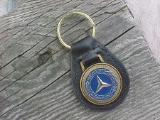 MERCEDES BENZ BLUE ON GOLD