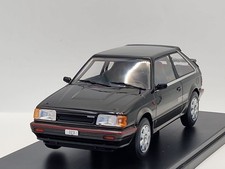 Mazda 323 4WD Turbo 1989 schwarz grau Modellauto 1:24 Whitebox