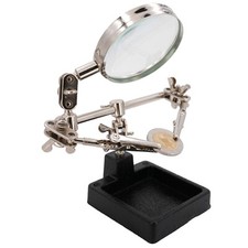 Dritte Hand mit Lupe