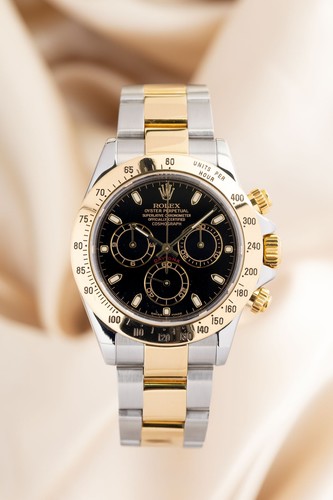 Rolex daytona gold - rolex,