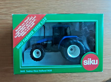 SIKU - 2652 - New Holland/Ford 5635 in OVP (Ausführung mit Breit-Reifen)