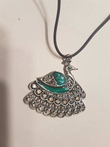 Kautschukkette mit pfau als - kautschukkette,