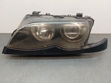 6910967 LEFT HEADLIGHT /