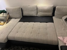 Ecksofa U-Form mit Schlaffunktion in schwarz-grau Kunstleder/Stoff
