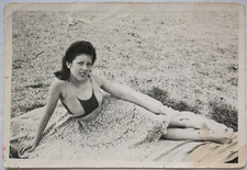 Young woman swimsuit, skirt