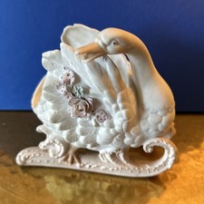 Porzellanfigur auf schlitten - auf,