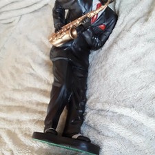 Skulptur musiker mit saxophon - musiker,