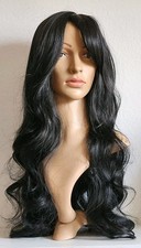  Schwarze lang gelockte Pony