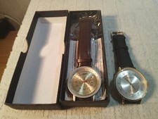 2 Japanische Marken Uhren 1 mal Akzent und 1 mal Erik Chevilland