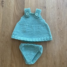 Handgestrickte Kleidung f