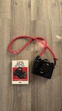 Canon A1 mit Objektiv und