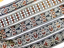 Borte Webband schwarz-beige-kupfer verschiedene Muster lfm 50mm breit B135